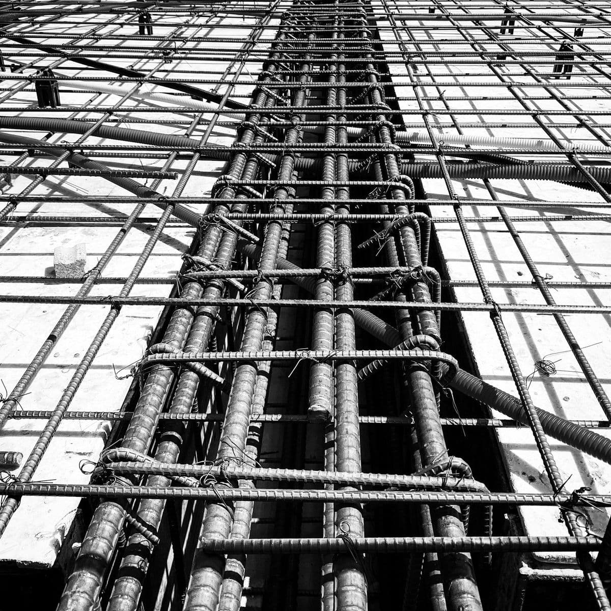 Steel rebar inside a concrete column — the structural element that galvanic cathodic protection systems guard against corrosion