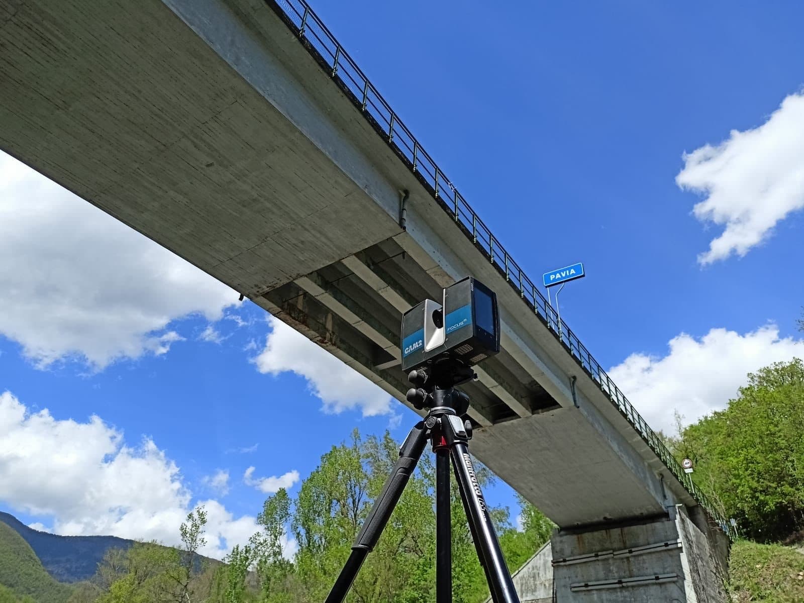 Terrestrial laser scanner surveying a concrete bridge for deformation monitoring